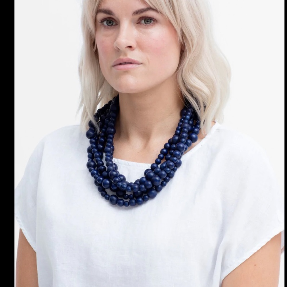 Multi strand wood navy necklace by Elk the Label. Handmade by artisans.